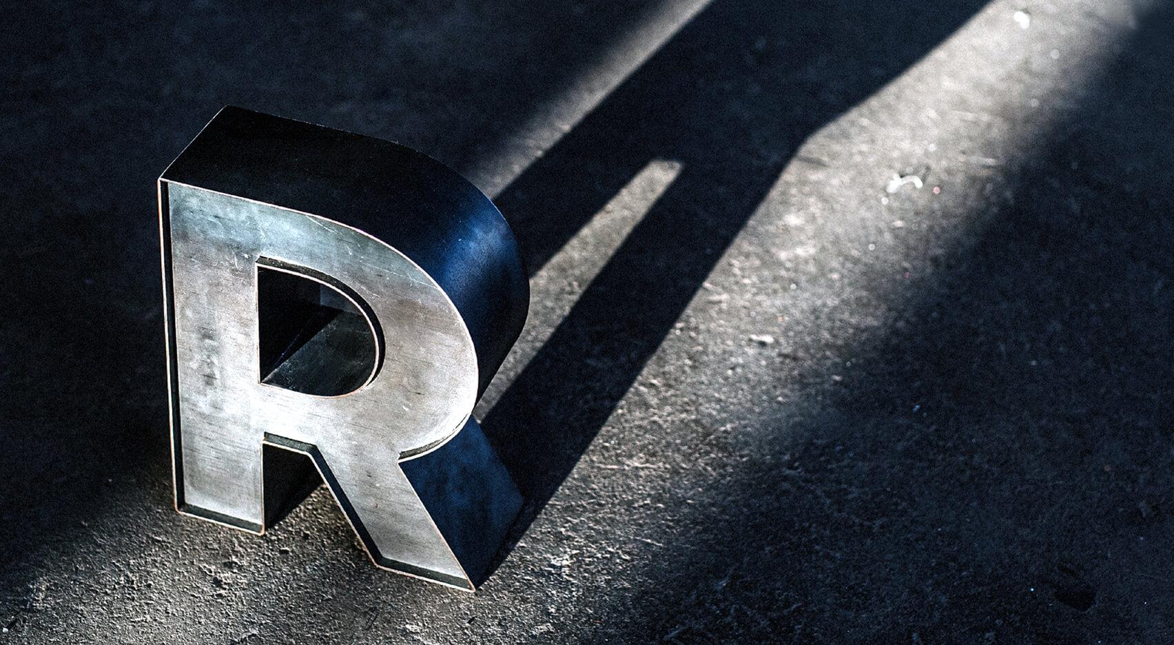 Letter R made of steel sheet in industrial style.