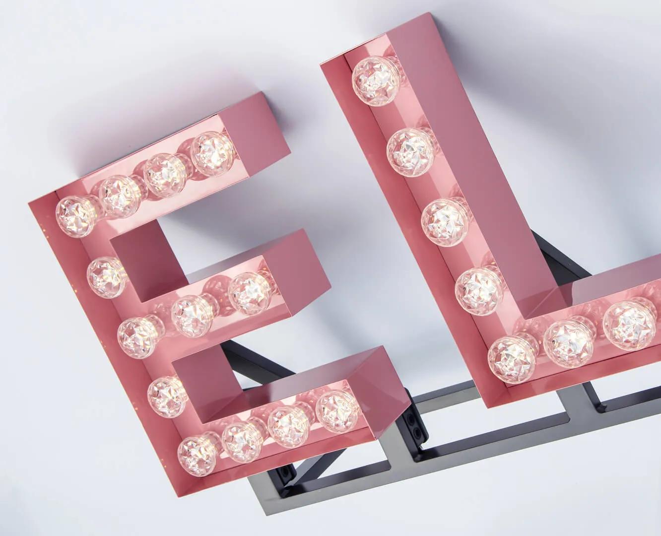 Light bulb letters in pink