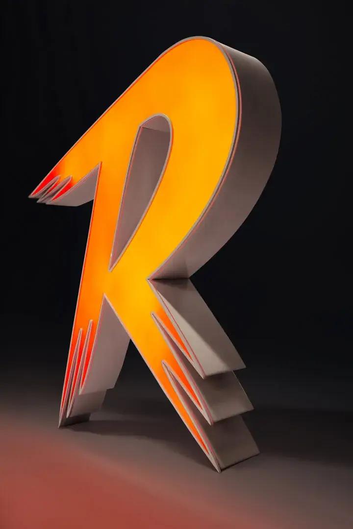 illuminated custom letter R in orange color