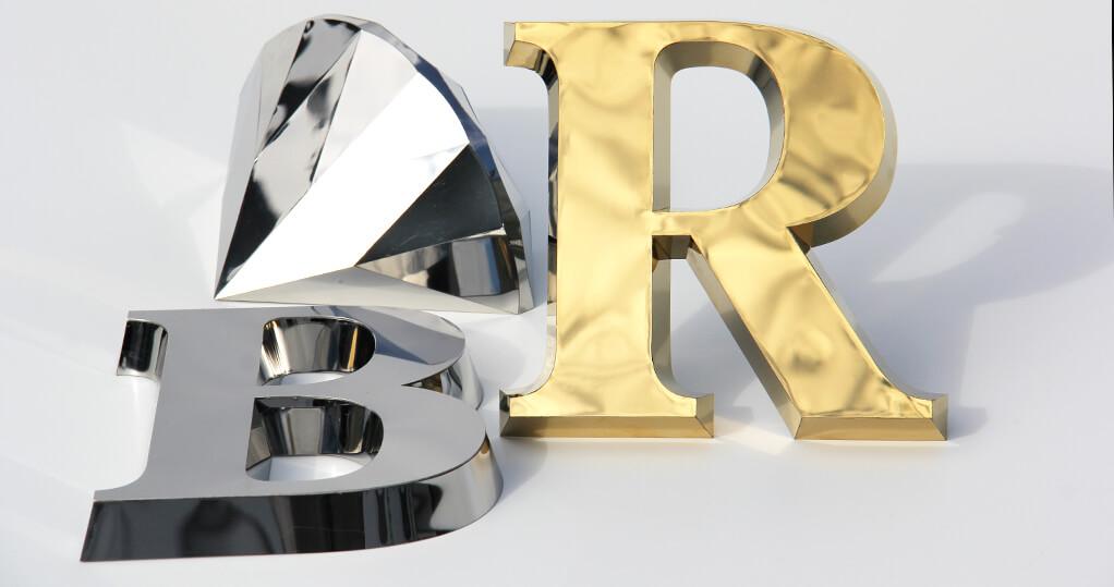 Metal letters in silver and gold color