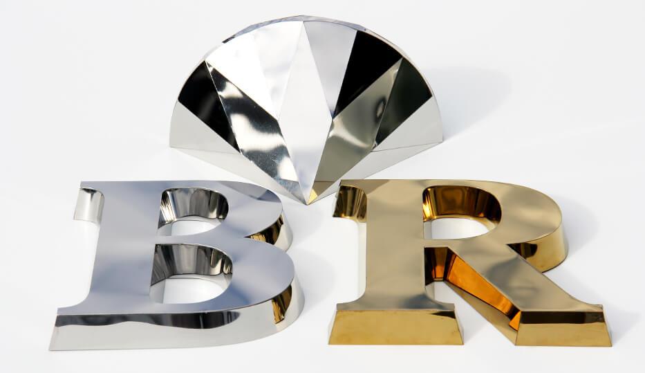 Stainless steel letters in silver and gold