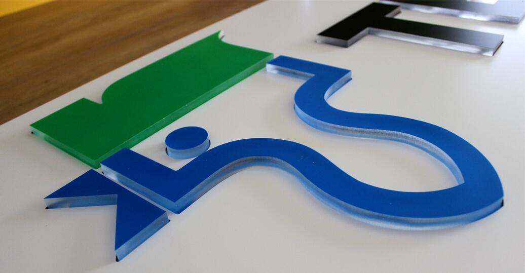 Teknos - light box with spatial letters and logos