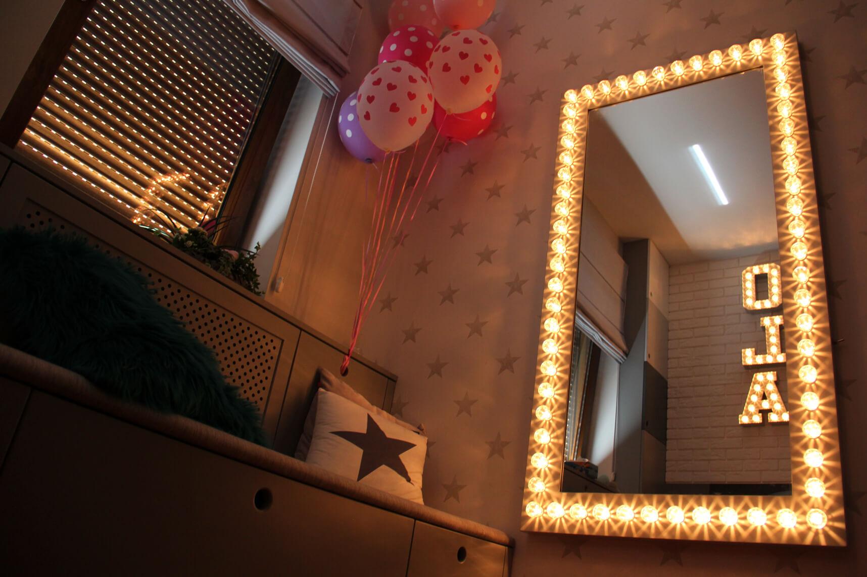 Mirror illuminated with light bulbs