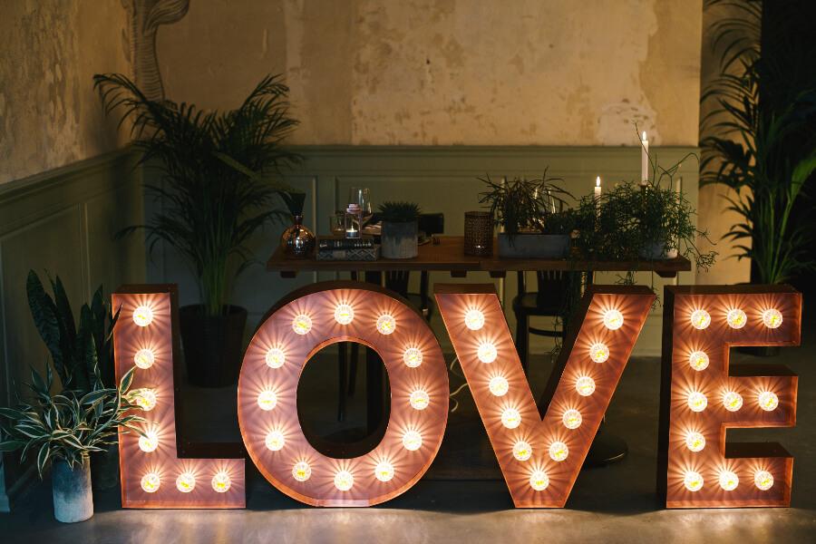 Spatial letters with bulbs with inscription Love