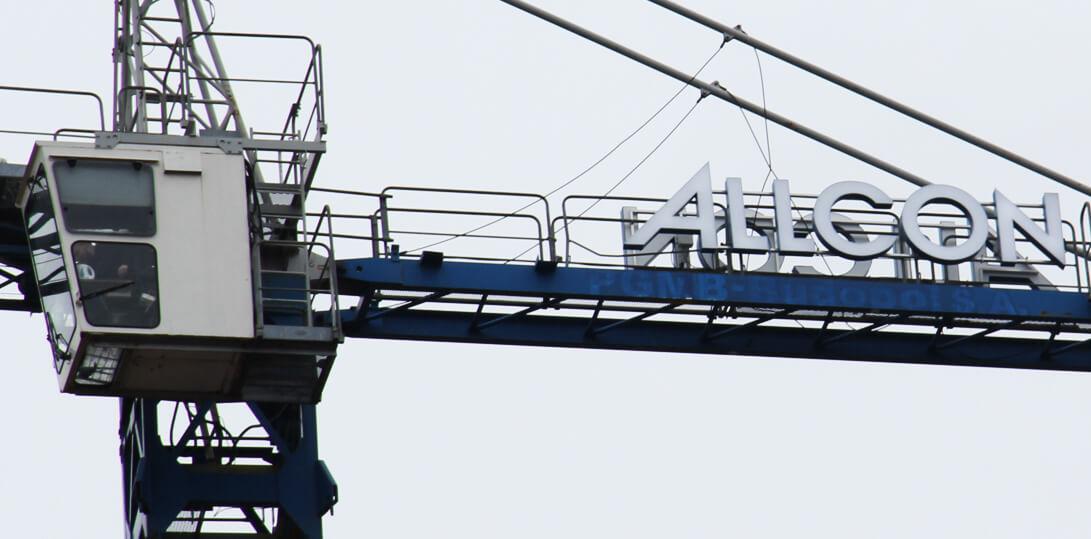 Allcon - spatial light letters on a frame on a crane