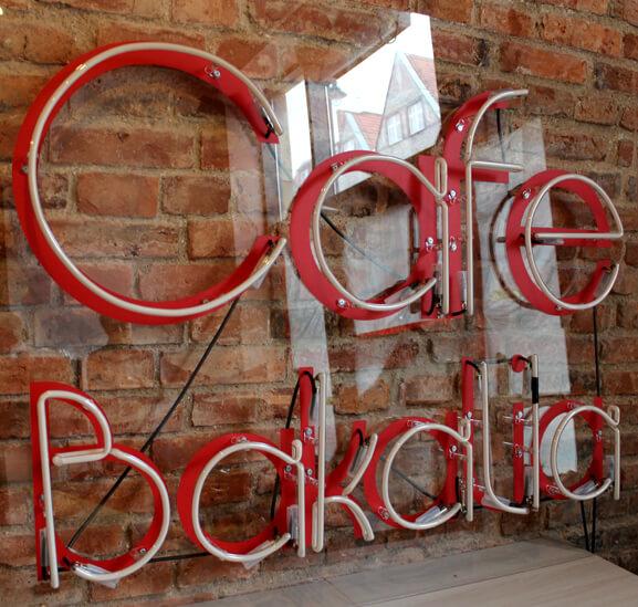 Cafe Bakalia - indoor advertising neon sign in red color