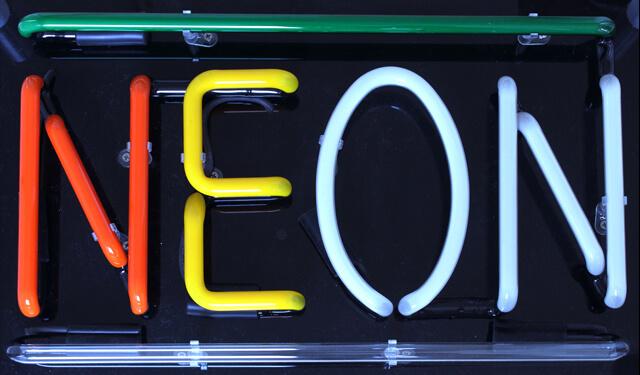 Neon lettering created from different colored neon signs