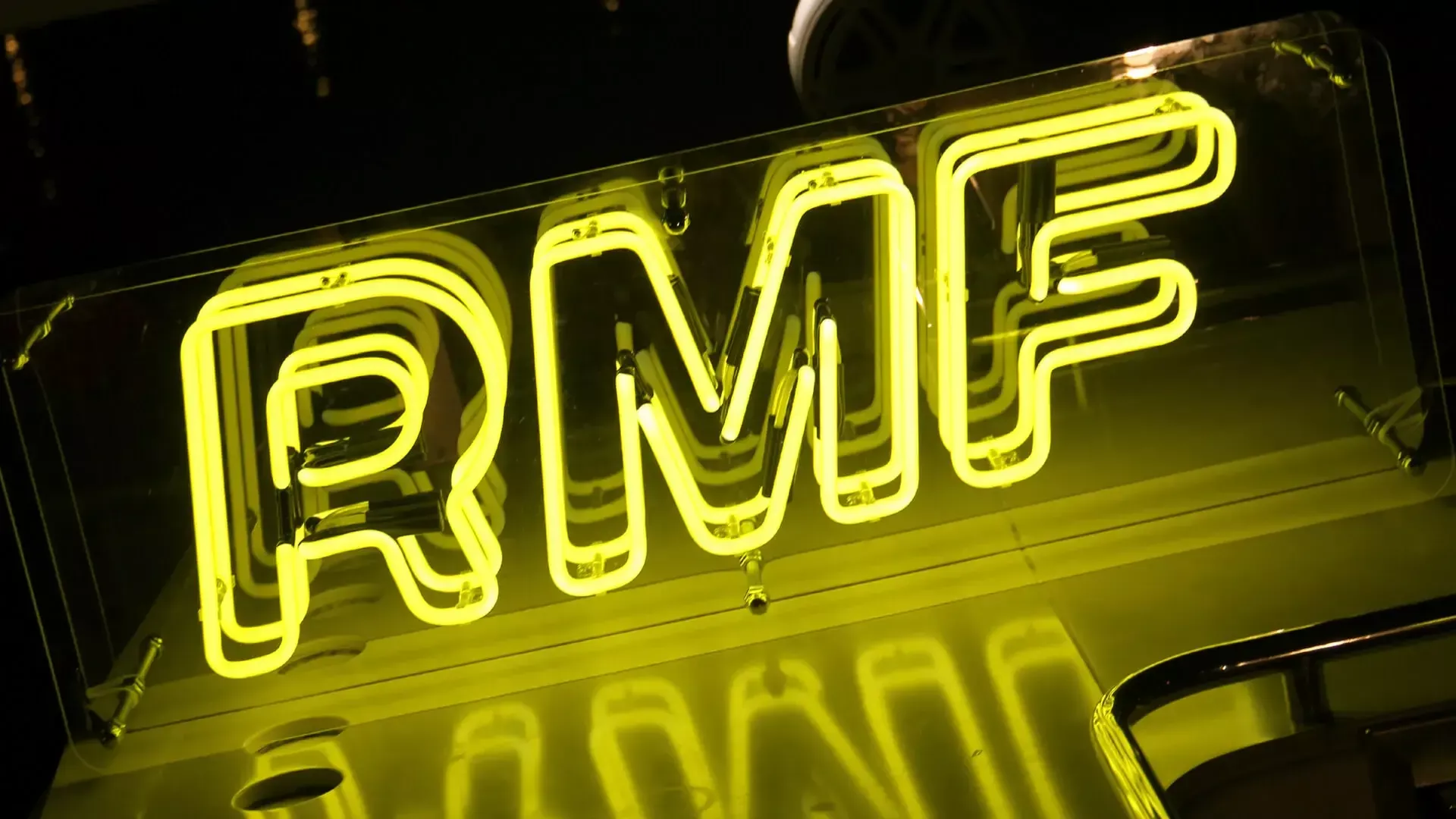 RMF - Yellow neon sign for RMF Radio, neon advertisement.
