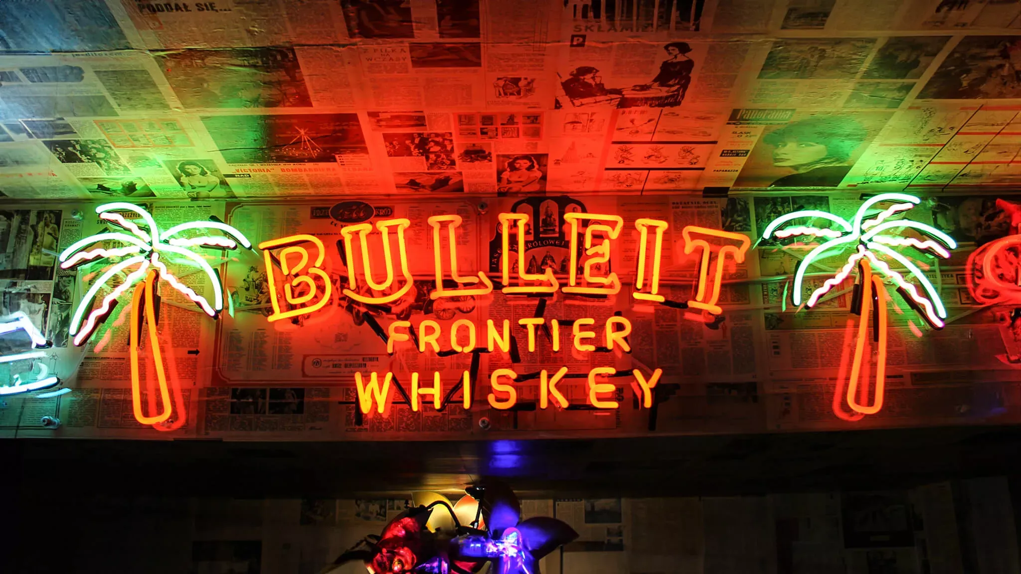 Bulleit - logo and lettering along with palms made of neon