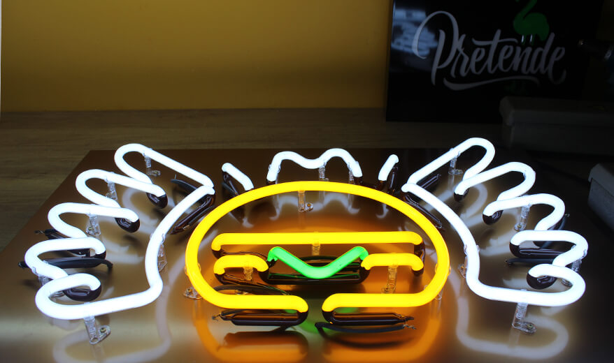 Mat Burger - neon sign advertising symbols placed next to the entrance