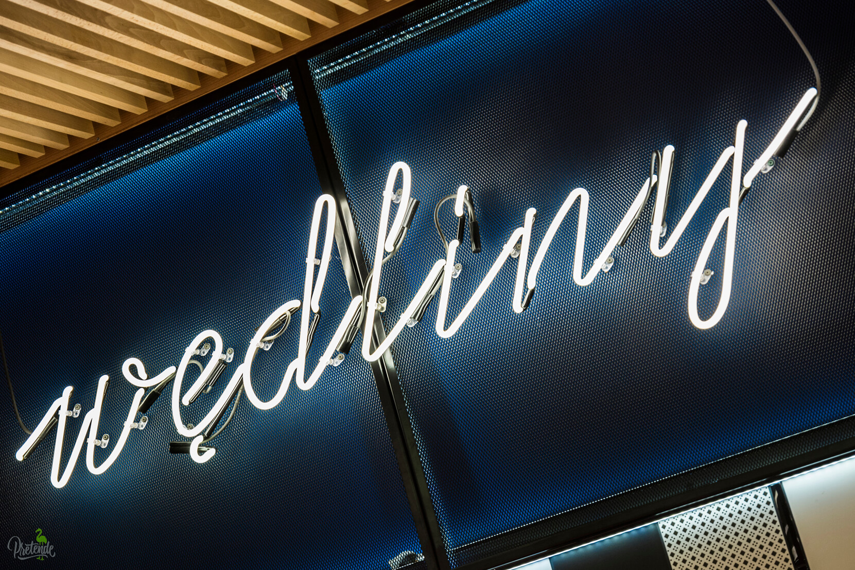 neon-wedlines-neon-in-store-neon-behind-the-counter-neon-on-the-wall-of-the-store-inside-neon-lettering-neon-over-the-head-neon-on-the-stool-max-xavier-store-gdansk