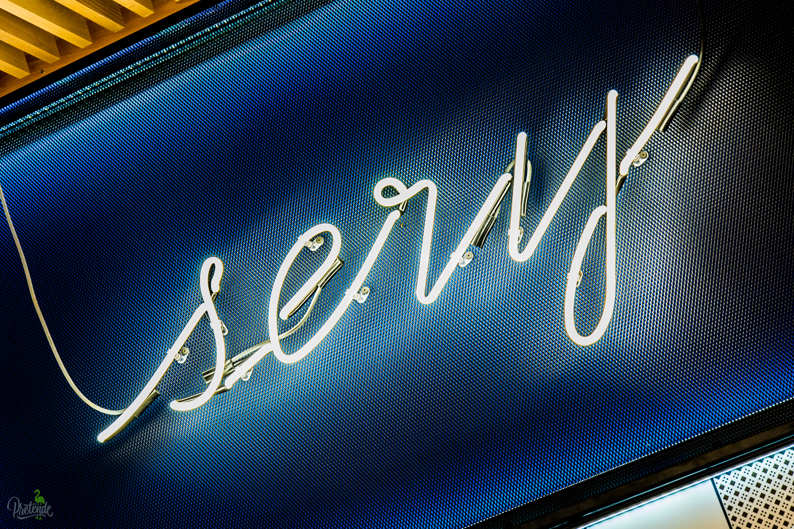 neon-series-neon-in-shop-neon-behind-the-counter-neon-neon-on-the-wall-of-the-store-inside-neon-lettering-neon-over-the-head-neon-neon-on-the-stool-max-xavier-store-gdansk