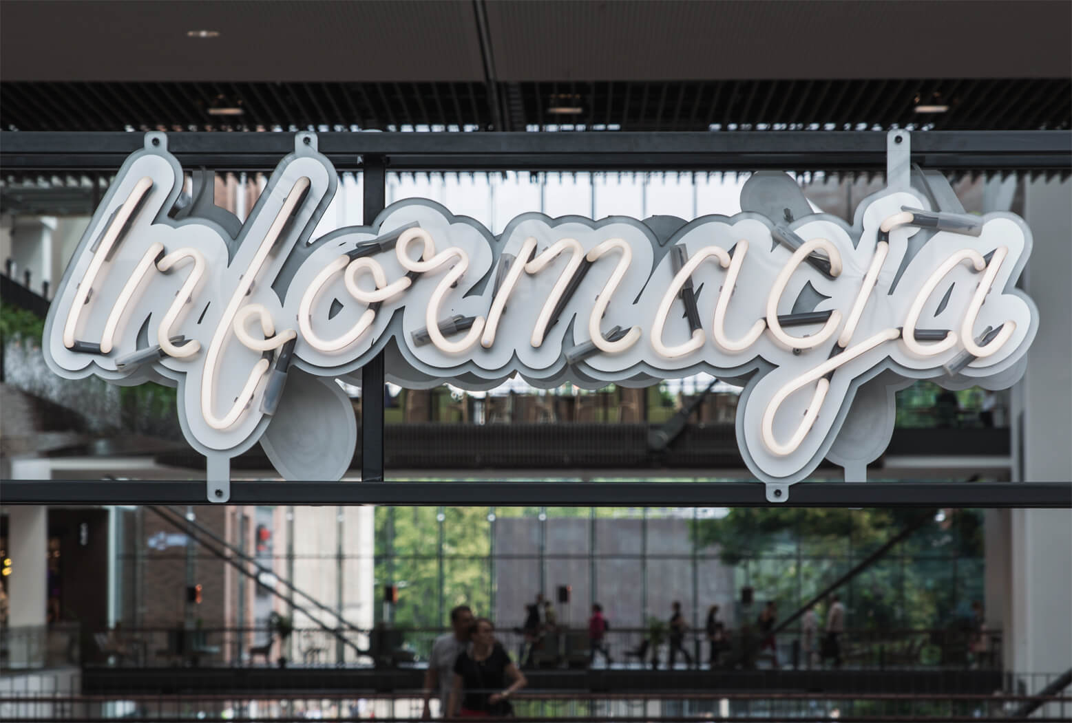 neon-information-white-color-neon-behind-reception-neon-information-neon-underlit-neon-in-trade-center-forum-gdansk-information