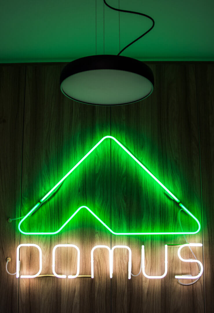 neon-domus-neon-sub-lit-neon-on-wooden-wall-neon-interior-neon-in-office-neon-order-architects-kilometer-green-color-white-neon-mounted-to-the-wall-neon-letters