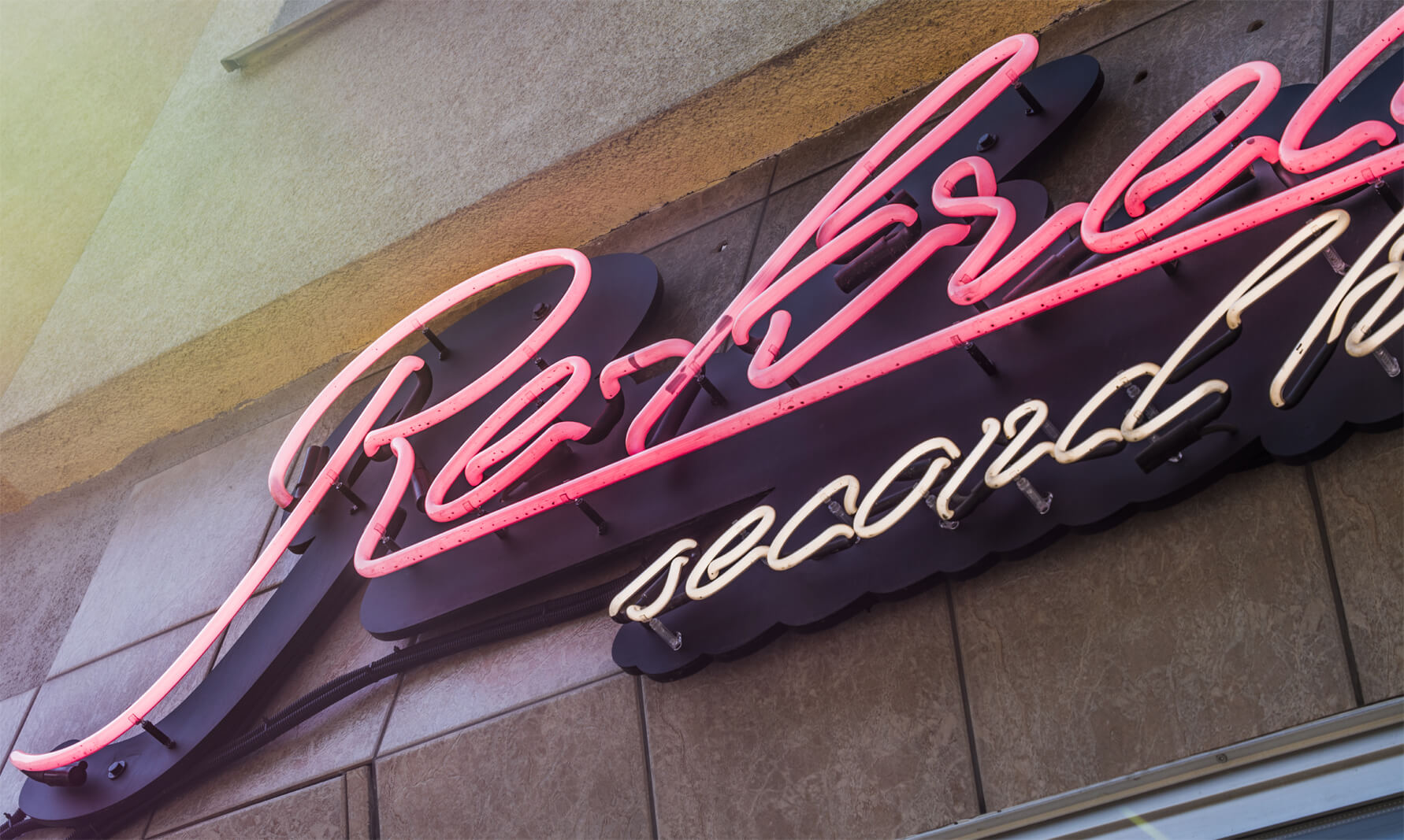 recreation-secondhand-secondhand-neon-glass-illuminated-on-the-floor-neon-over-the-entry-neon-on-the-tiles-neon-on-the-outside-retro-neon-advertising-neon-signs-scream-