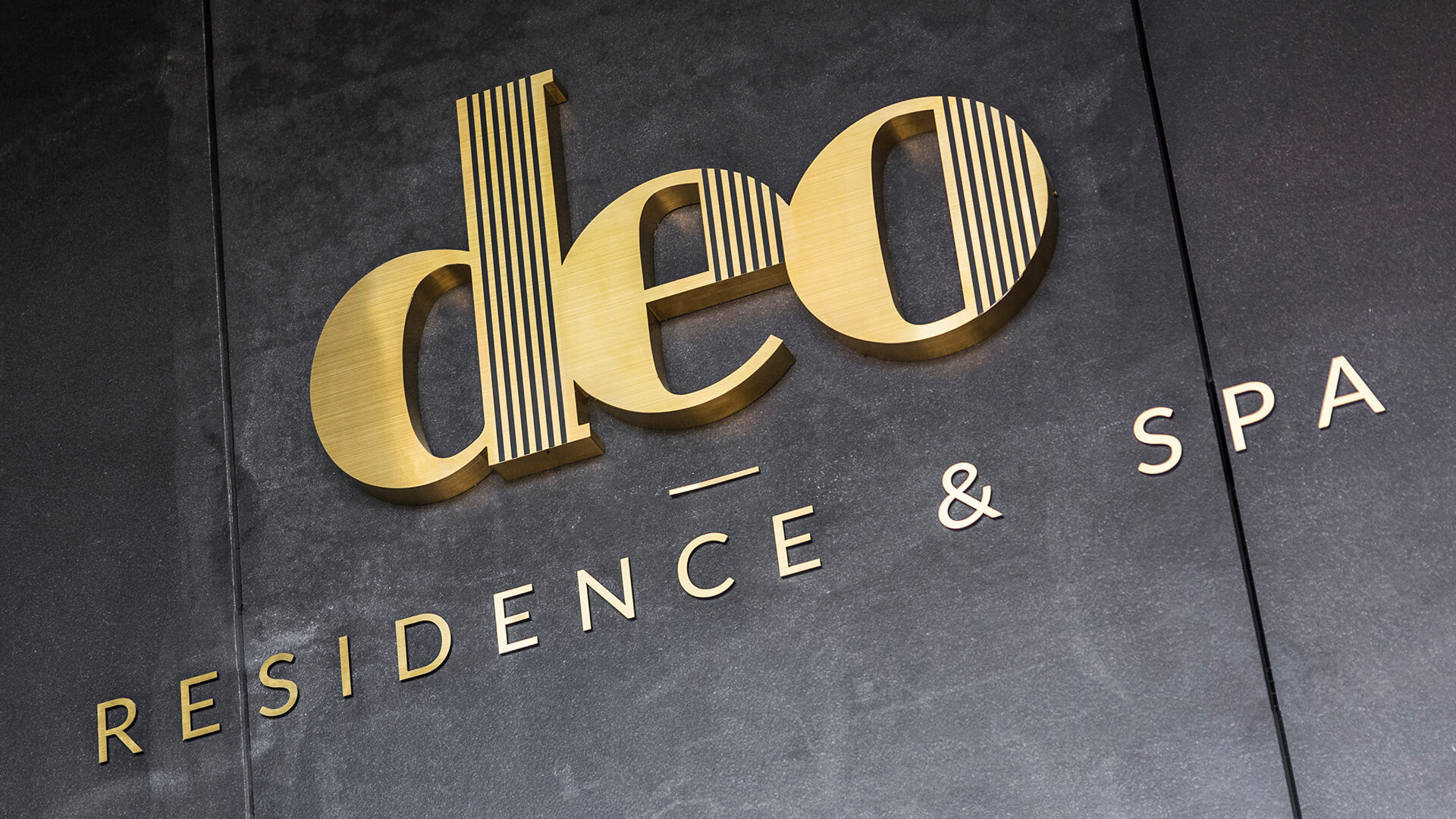 deo-residence-lettering-from-solid-steel-brushed-lettering-over-the-entry-to-the-office-building-lettering-at-height-mounted-to-the-wall-lettering-on-sheets-lettering-on-decks-logo-firm-gdansk