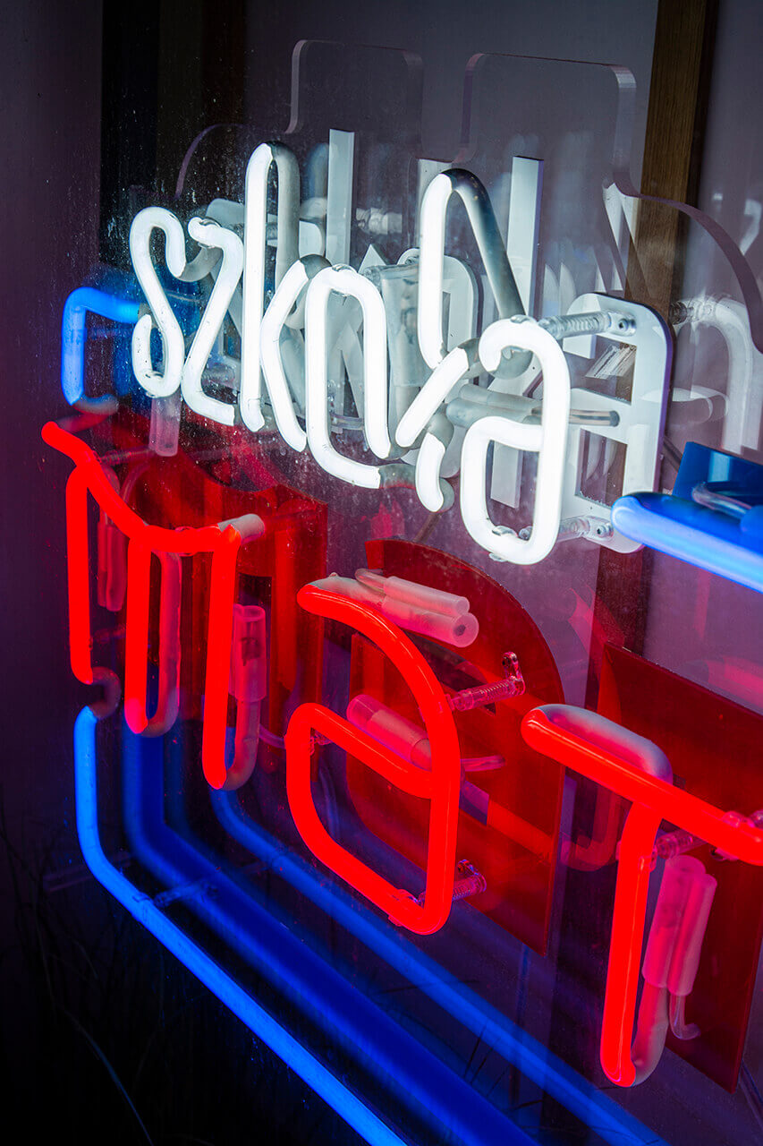 matsuri-school-linguistic-neon-on-plexi-hanging-behind-the-glass-neon-at-the-entry-neon-colour-logo-firm-neon-low-neon-on-exhibition-neon-in-office-red-glass-gdansk-przymorze