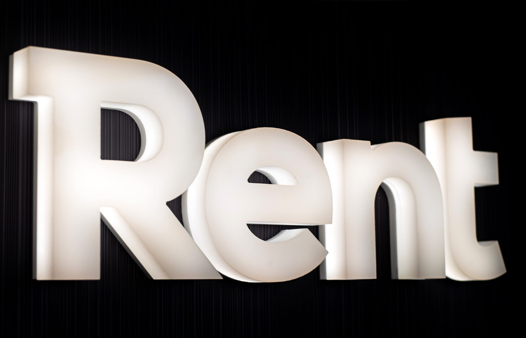 word RENT front-lit LED