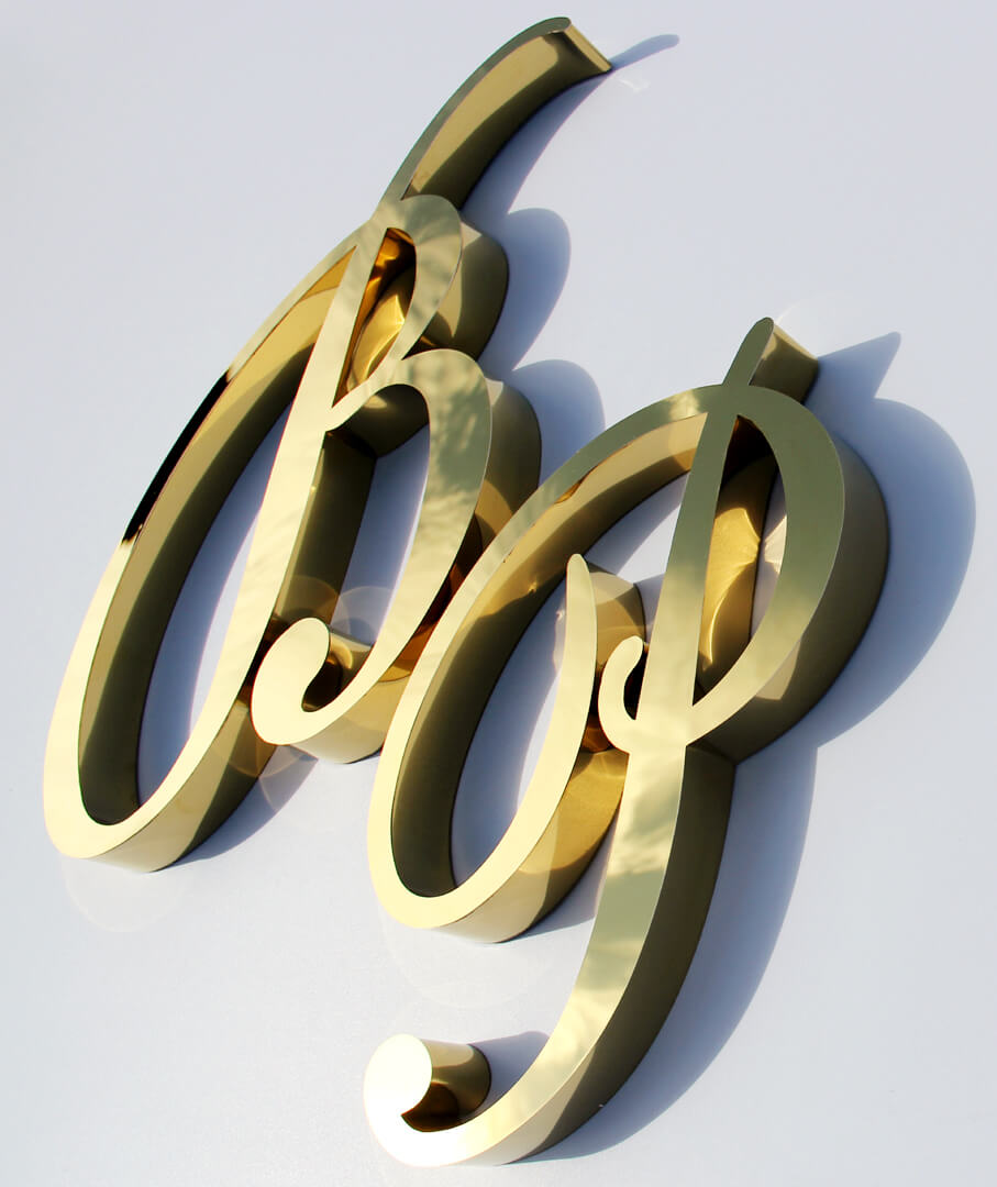 Gold letters B and P, artistic, unique. Made of stainless steel.