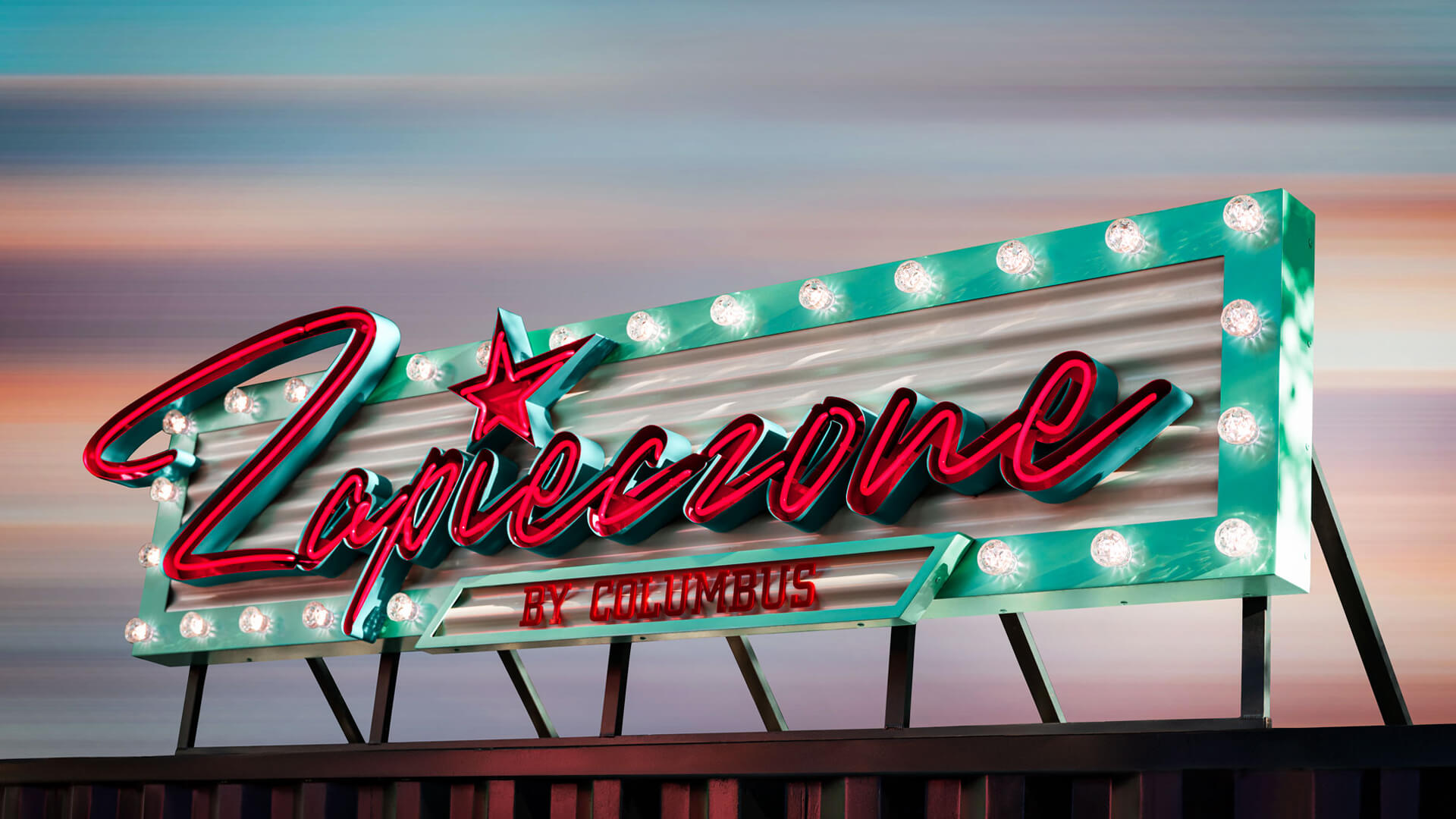 advertisement Baked by Columbus. Illuminated with neon and incandescent lights