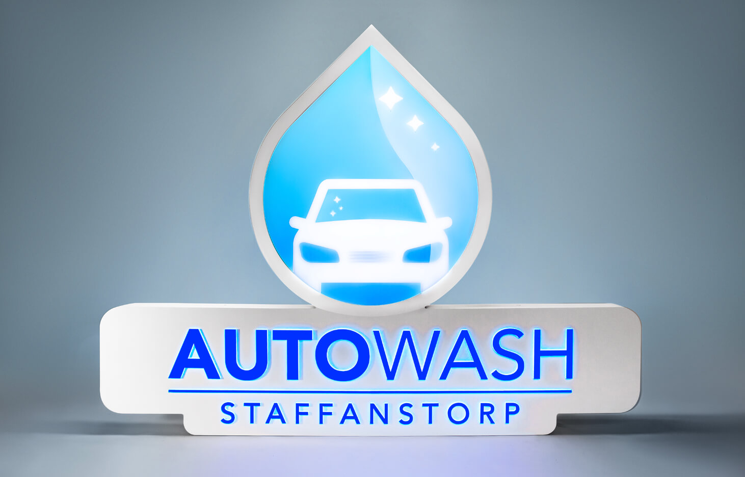 Illuminated logo coffer for Autowash company