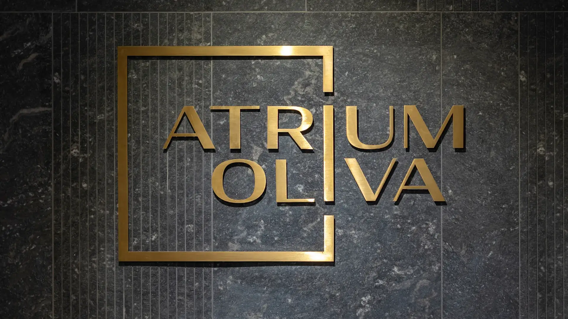 Atrium Oliva flat letters in brushed sheet metal