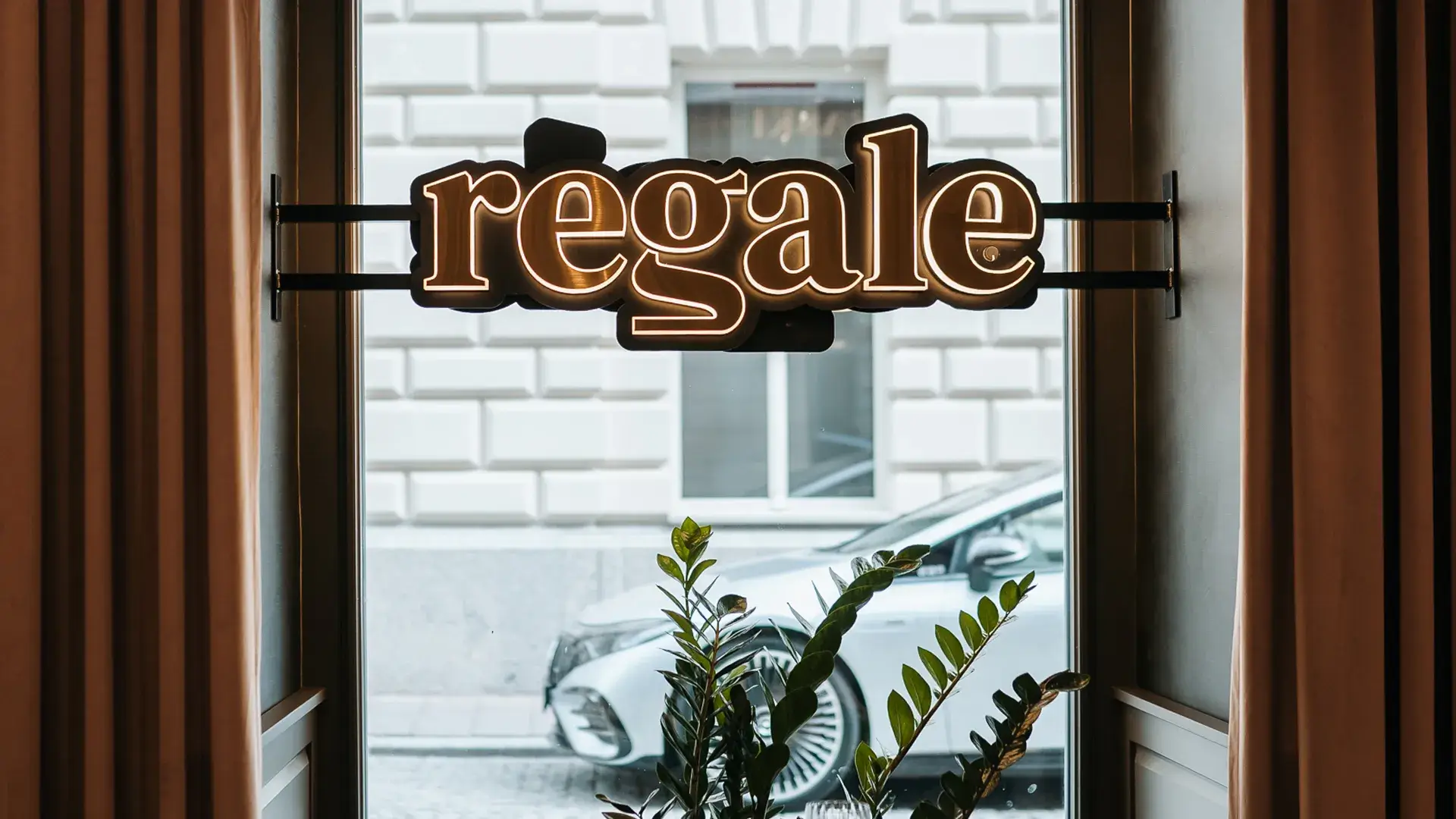 LED letters illuminating the side of Regale