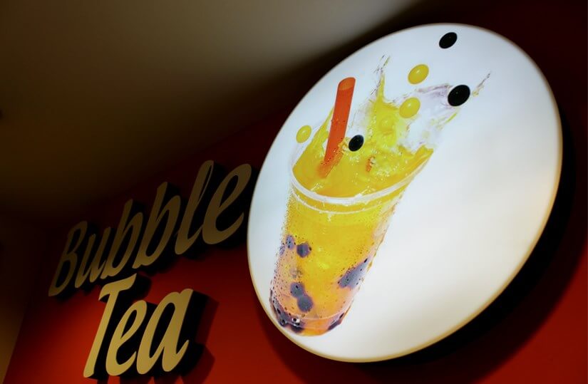 Bubbleology - illuminated advertising logo on round coffer