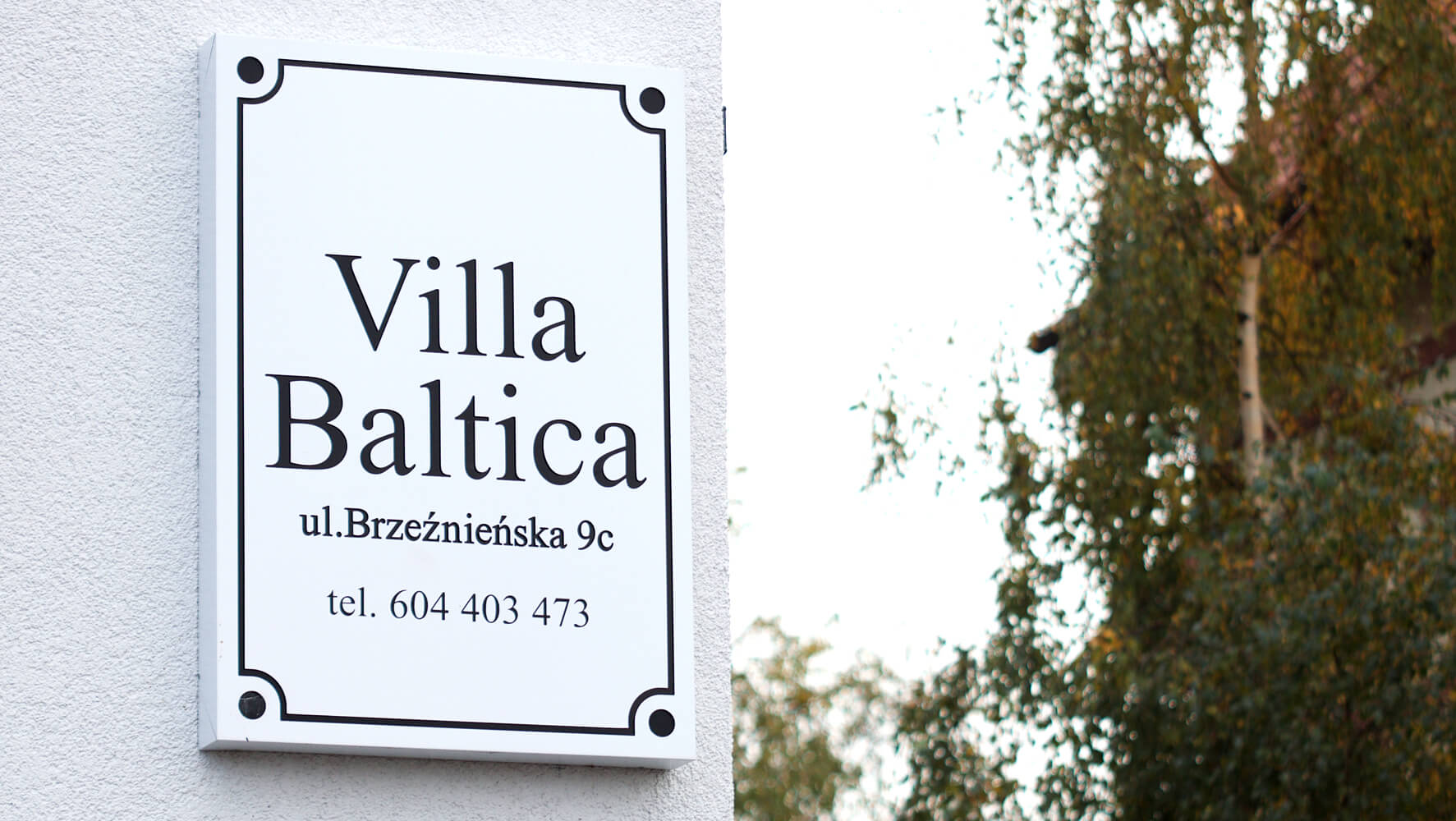 Villa Baltica - company signboard on dibond coffer in white matte color