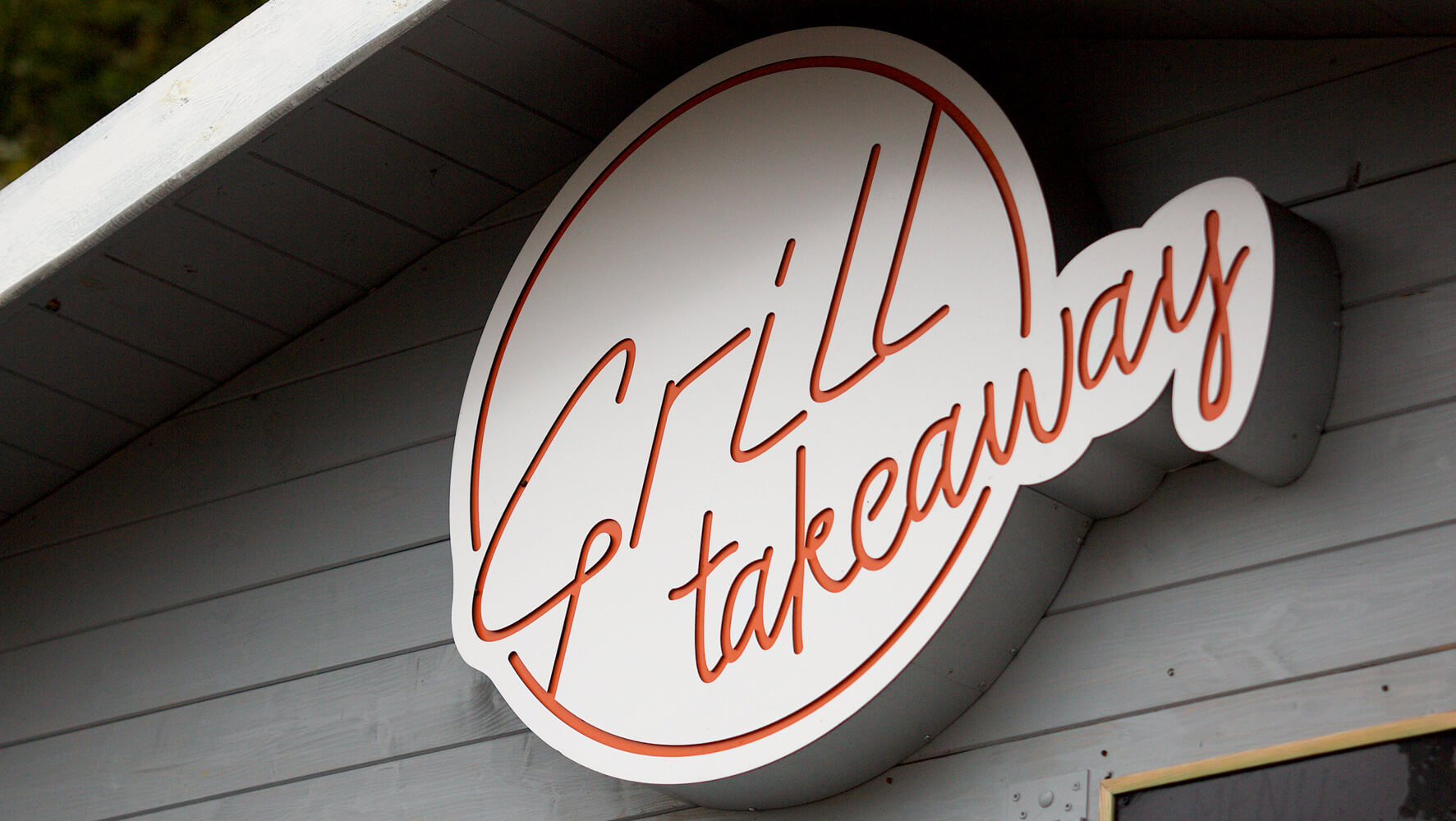 Grill Takeaway - LED coffer with company logo above the entrance