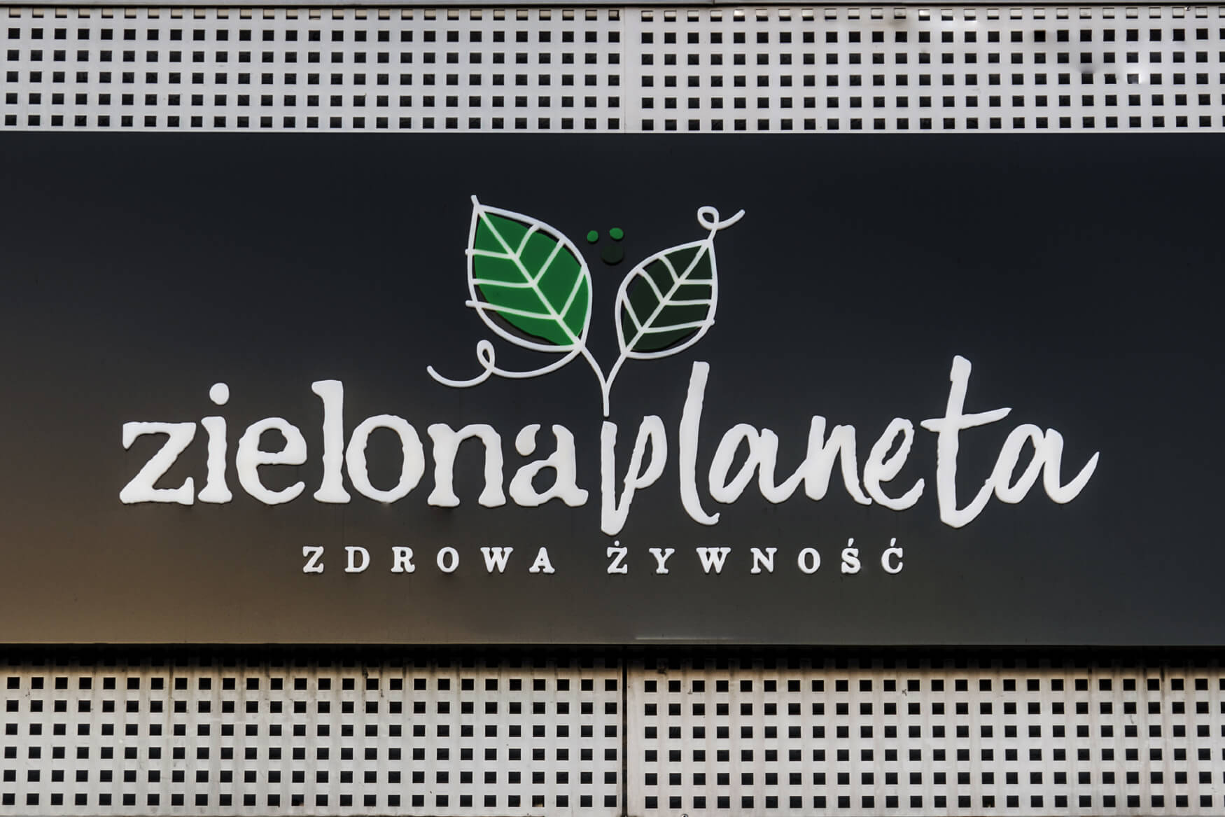 Green Planet - light advertising coffer with letters and spatial logo