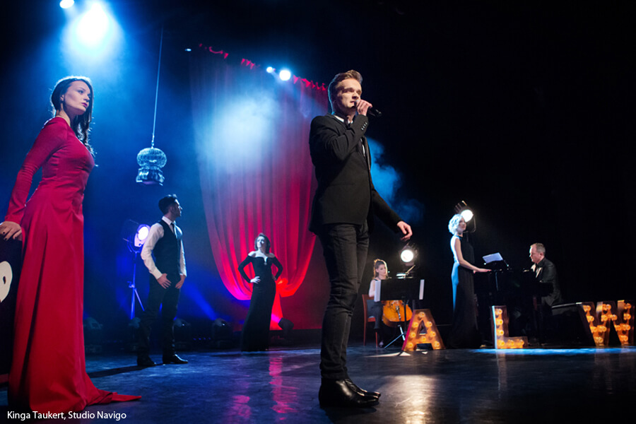 Letters with light bulbs on stage