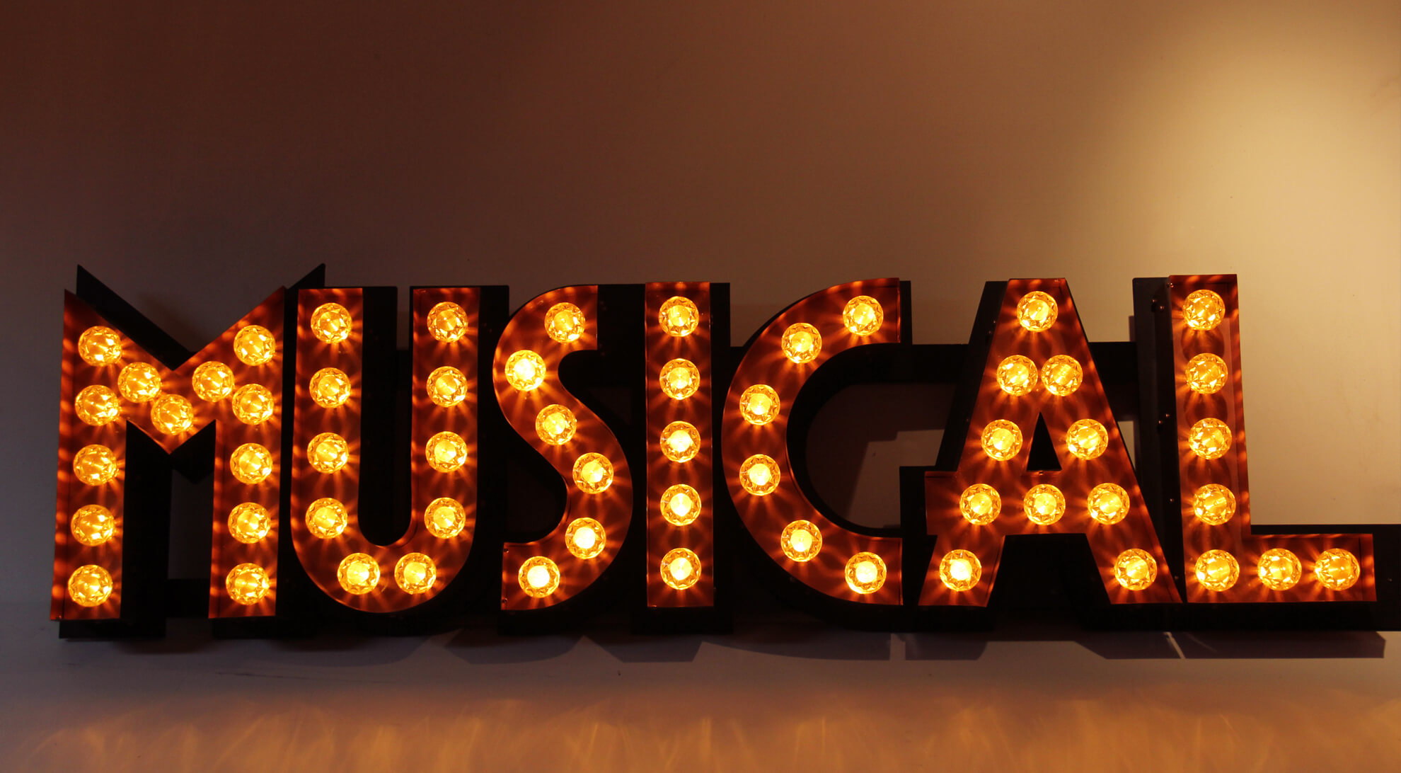 Musical arts inscription in 3D luminous letters