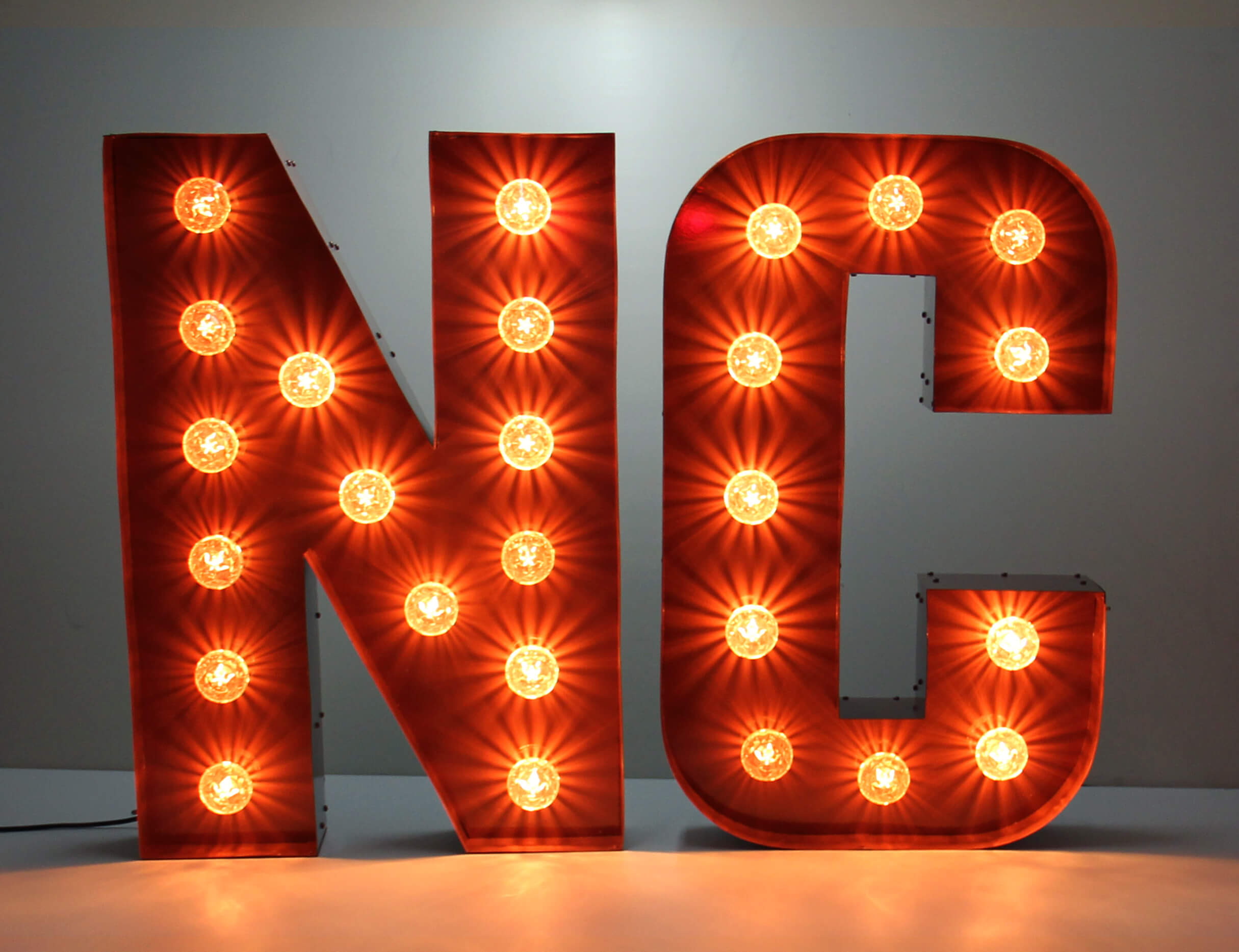 Letters with light bulbs