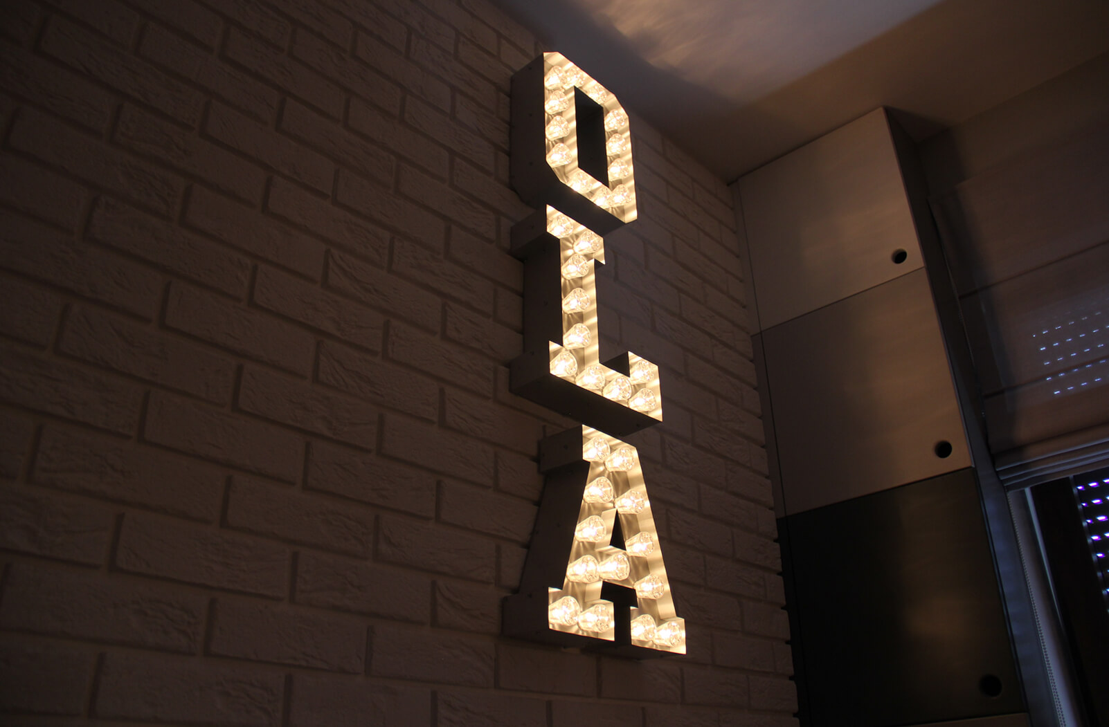 Ola letters in a vintage style apartment