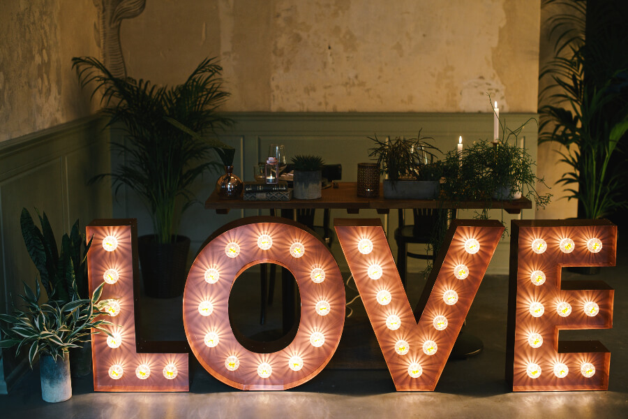 Spatial letters with bulbs with inscription Love