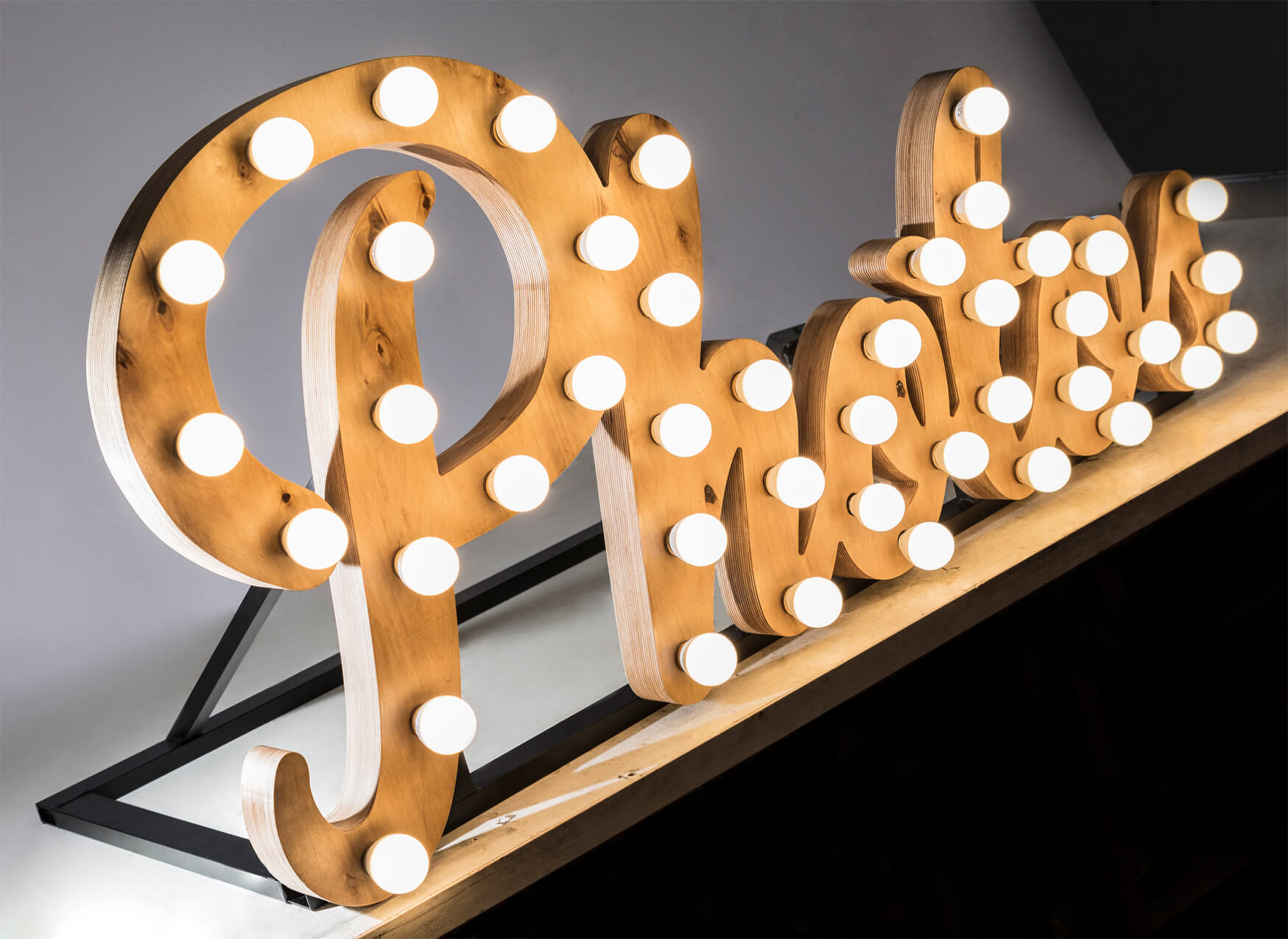 Wooden letters with bulbs