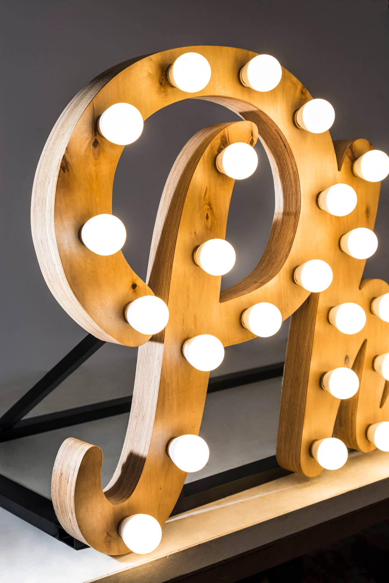 Wooden letters with bulbs