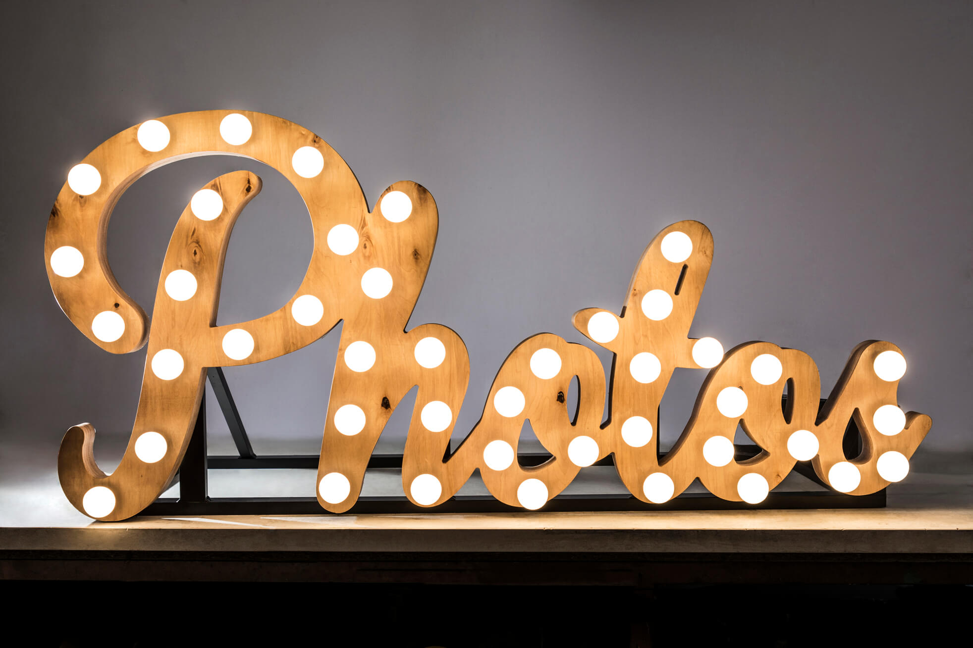 Wooden letters with bulbs