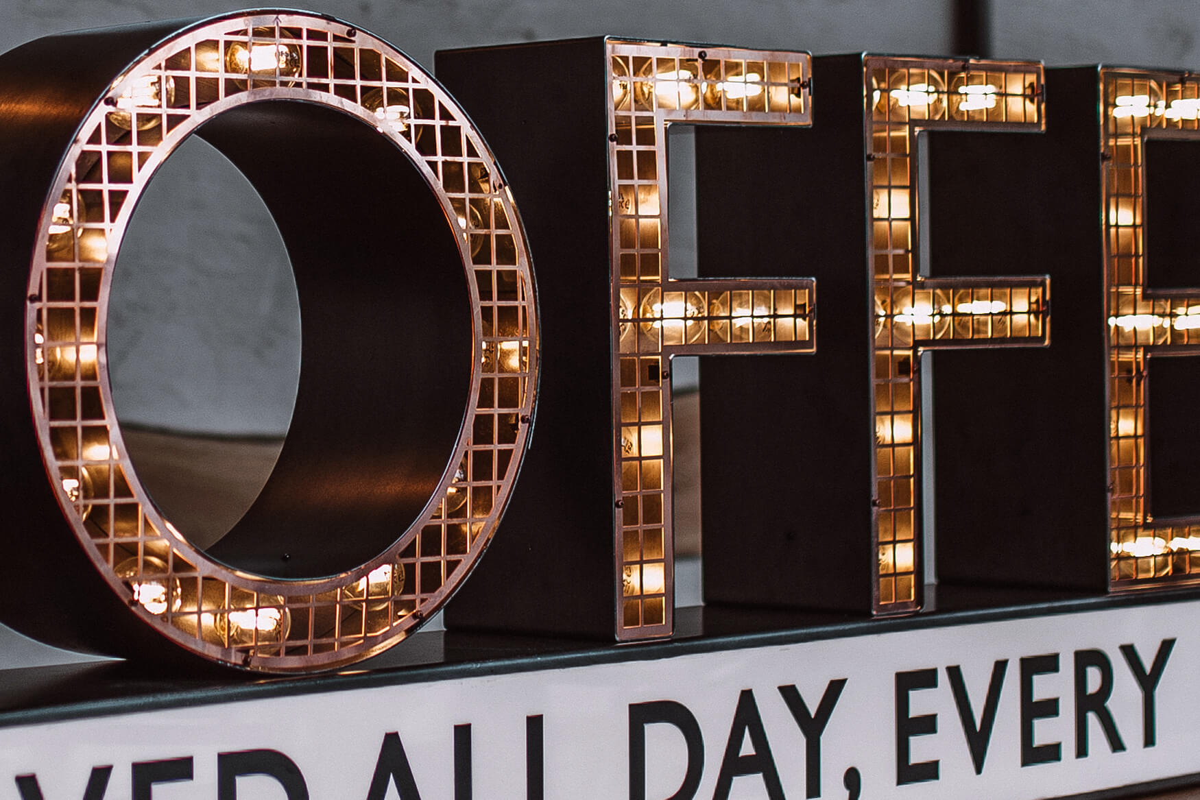 Coffee - Letters with light bulbs on a frame