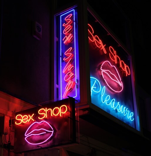 Sex Shop - outdoor neon sign placed above the entrance