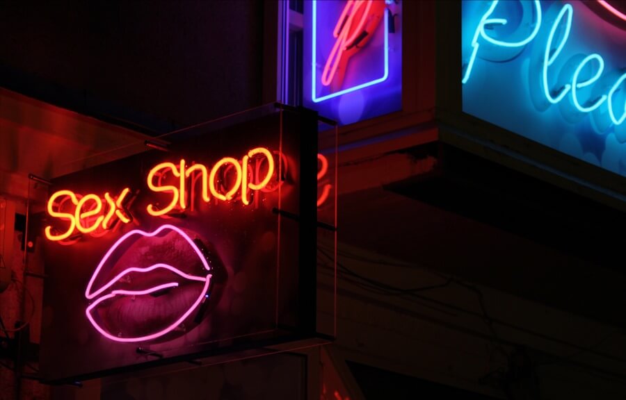 Sex Shop - outdoor neon sign placed above the entrance