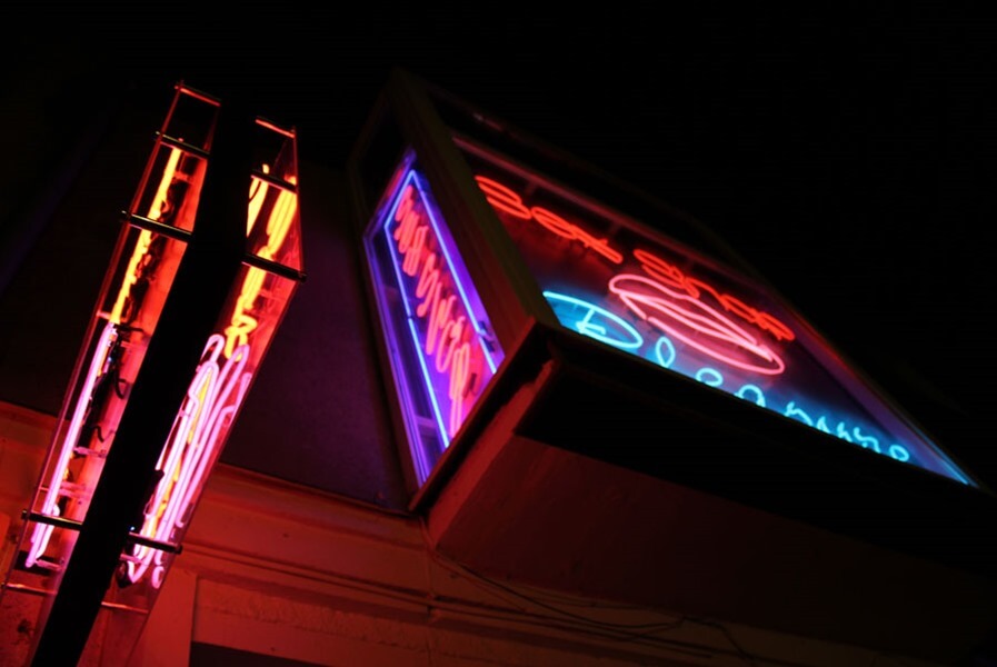 Sex Shop - outdoor neon sign placed above the entrance