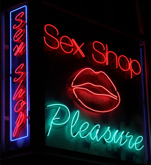 Sex Shop - outdoor neon sign placed above the entrance