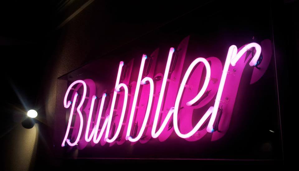 Bubbler - outdoor neon sign, placed above the entrance