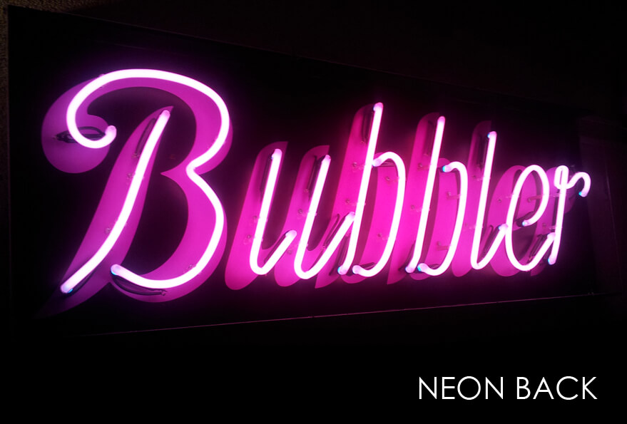 Bubbler - outdoor neon sign, placed above the entrance