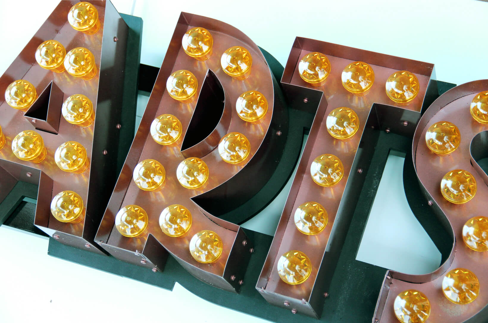 letters with bulbs - Musical arts inscription composed of spatial luminous letters
