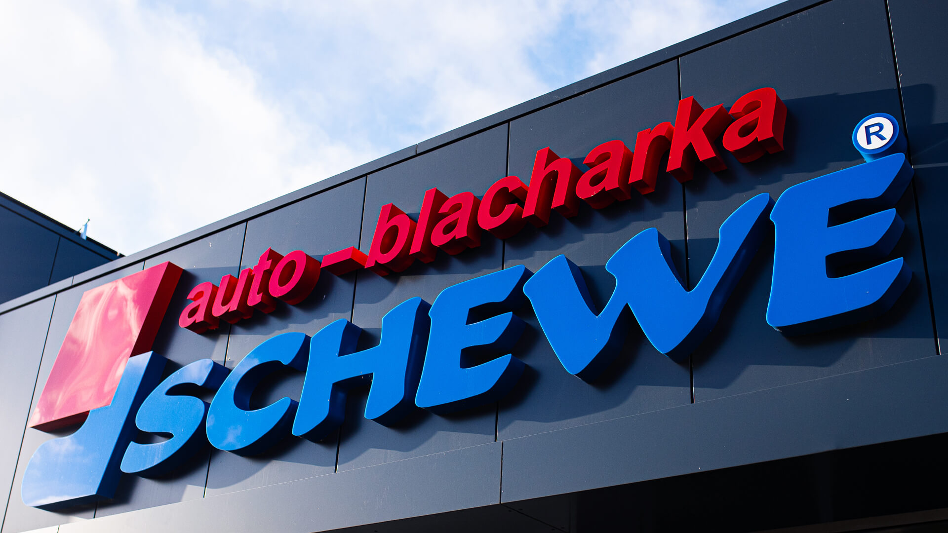 Auto blacharka Schewe - Large 3D letters, LED backlit, made of Plexiglas.
