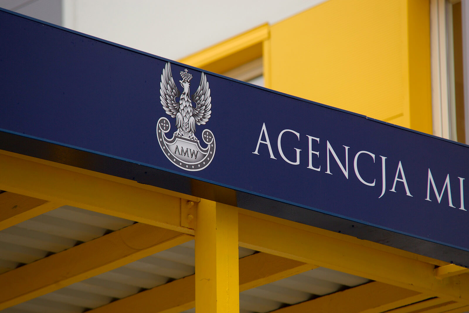 Property Agency Military - large-format coffers - Military Property Agency - large format lightbox with spatial lettering above the entrance