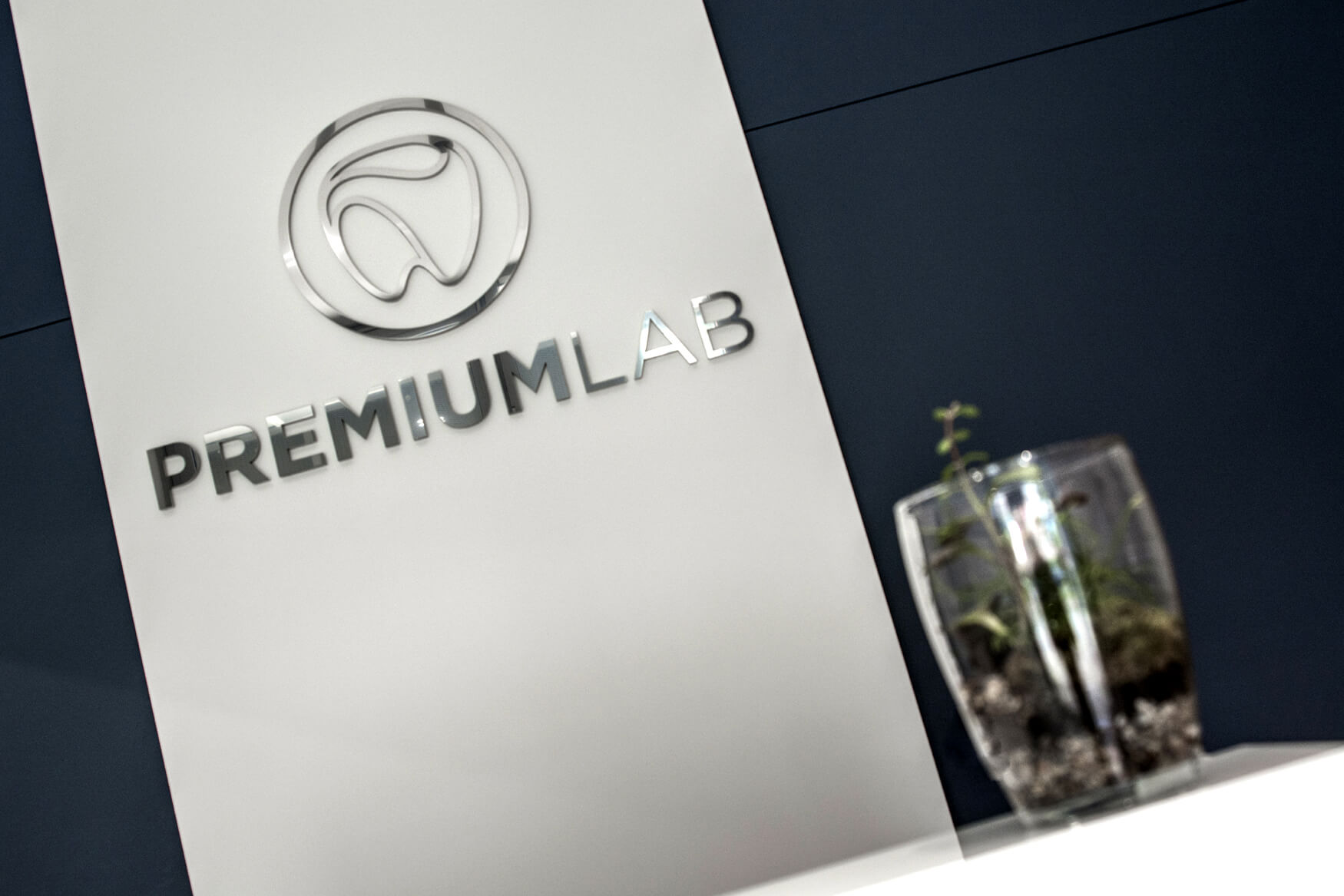 Premiumlab - Premiumlab - logo and 3D letters made of Plexiglas and polished stainless steel sheet placed in the lobby